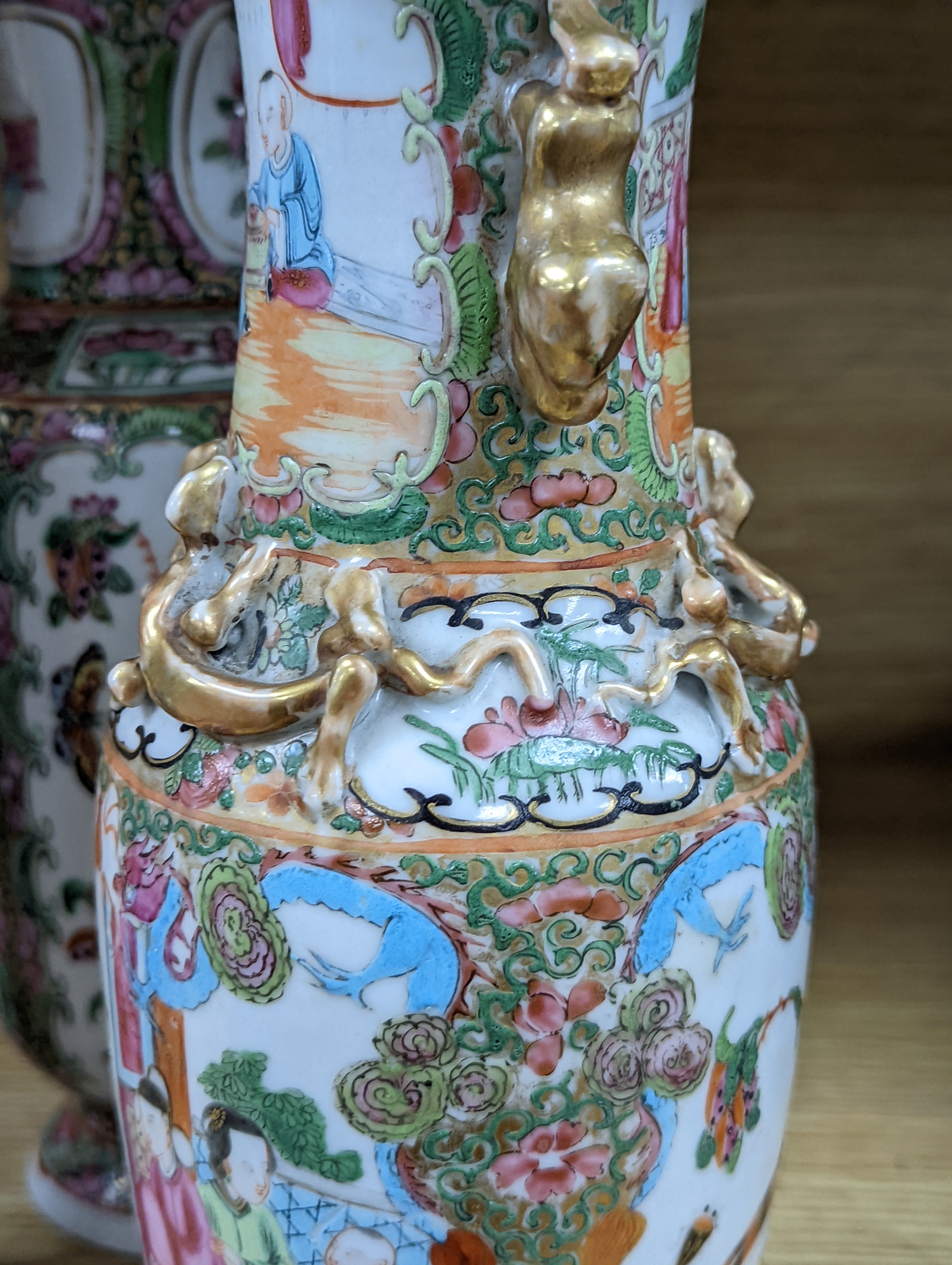 Two Chinese famille rose vases, late 19th century, tallest 26 cm, one wood stand, some restoration